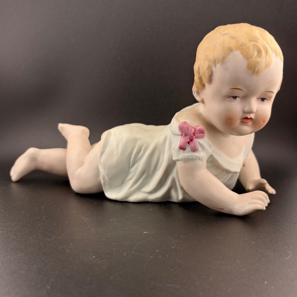 Gerbruder Heubach Porcelain Bisque Crawling Piano Baby Figurine, Pink Bow